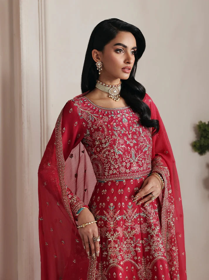 Discover luxury in this embroidered raw silk kalidaar featuring sequined bodice, chiffon dupatta with organza borders, and matching raw silk sharara.