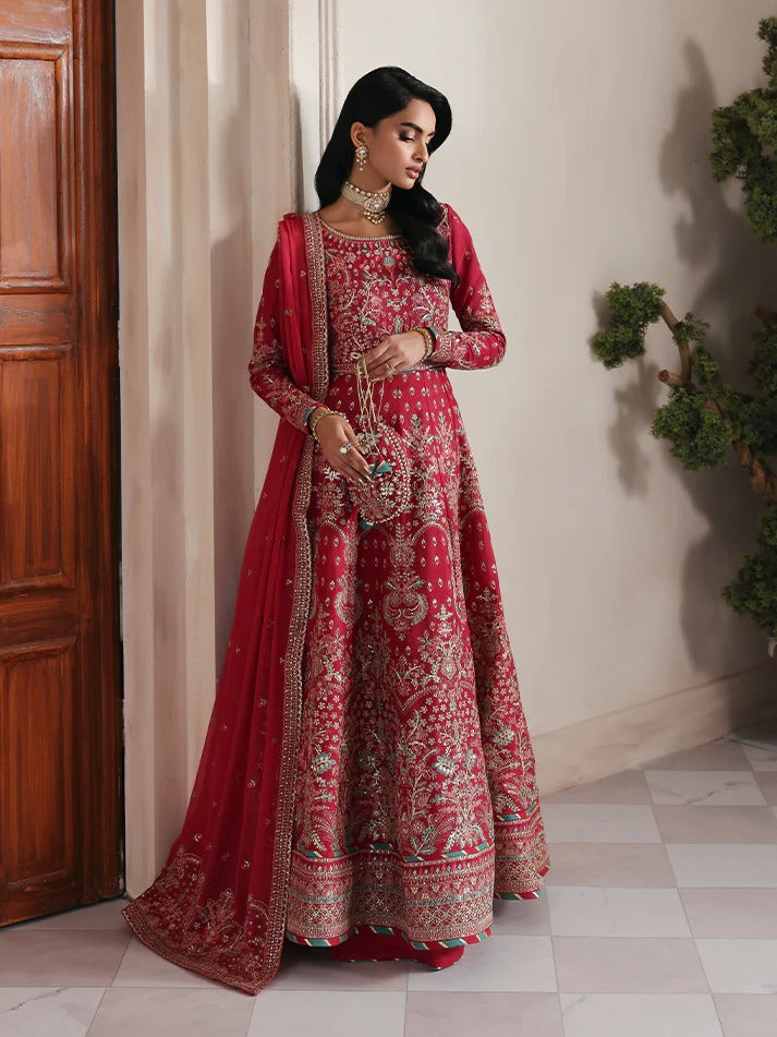 Discover luxury in this embroidered raw silk kalidaar featuring sequined bodice, chiffon dupatta with organza borders, and matching raw silk sharara.
