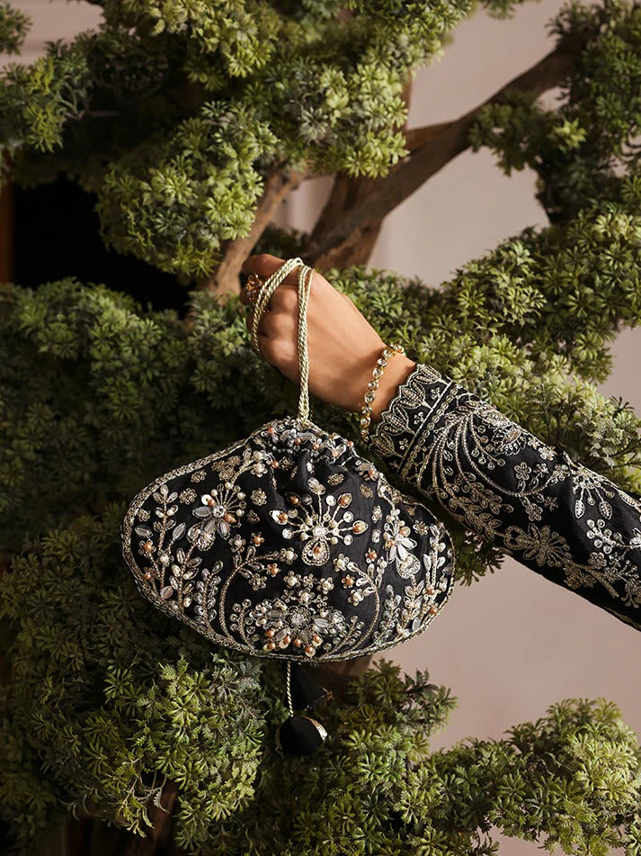 Elegant embroidered and sequined raw silk kalidaar with bodice, chiffon dupatta, and organza borders — a timeless outfit for festive and wedding wear.