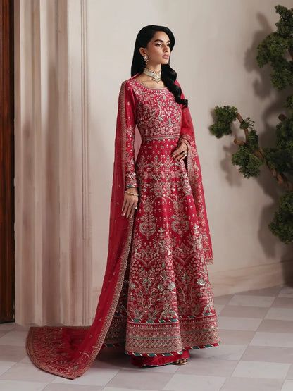 Discover luxury in this embroidered raw silk kalidaar featuring sequined bodice, chiffon dupatta with organza borders, and matching raw silk sharara.