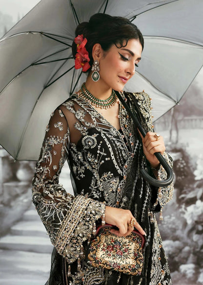 Majestic onyx noir suit with hand-embellished organza panels, refined borders, embroidered dupatta, and sleek trouser for timeless evening elegance.