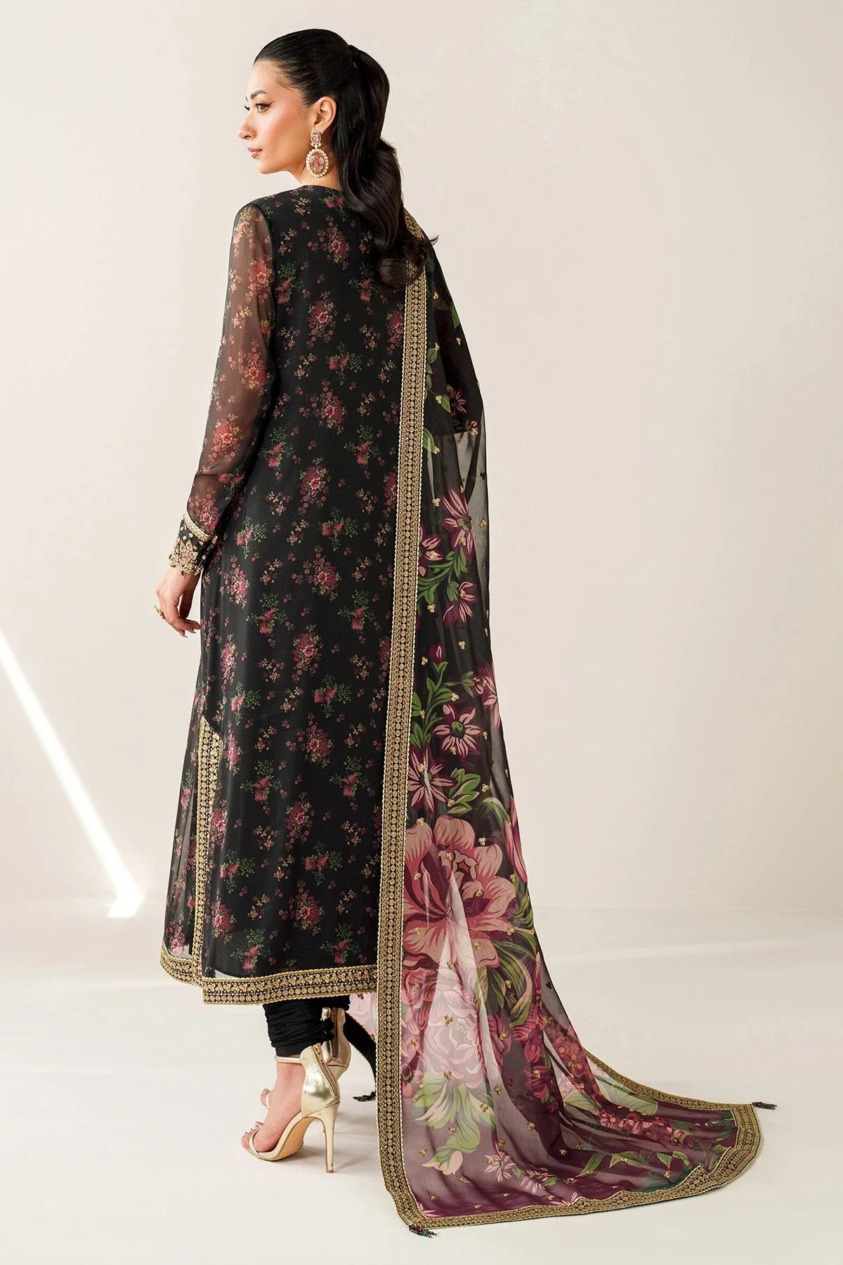 Digitally printed chiffon suit with intricate embroidery, bordered dupatta, and raw silk bottom—perfect for a graceful, formal, and timeless look.