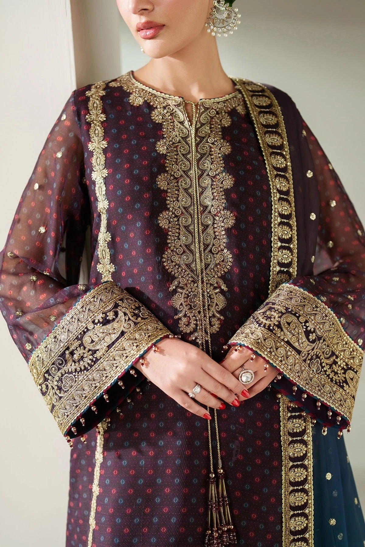 Elegantly embroidered chiffon with digital prints, bordered dupatta, and raw silk bottom—crafted for refined charm at weddings, events, or formal soirées.