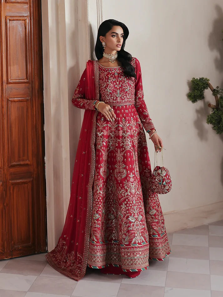 Discover luxury in this embroidered raw silk kalidaar featuring sequined bodice, chiffon dupatta with organza borders, and matching raw silk sharara.