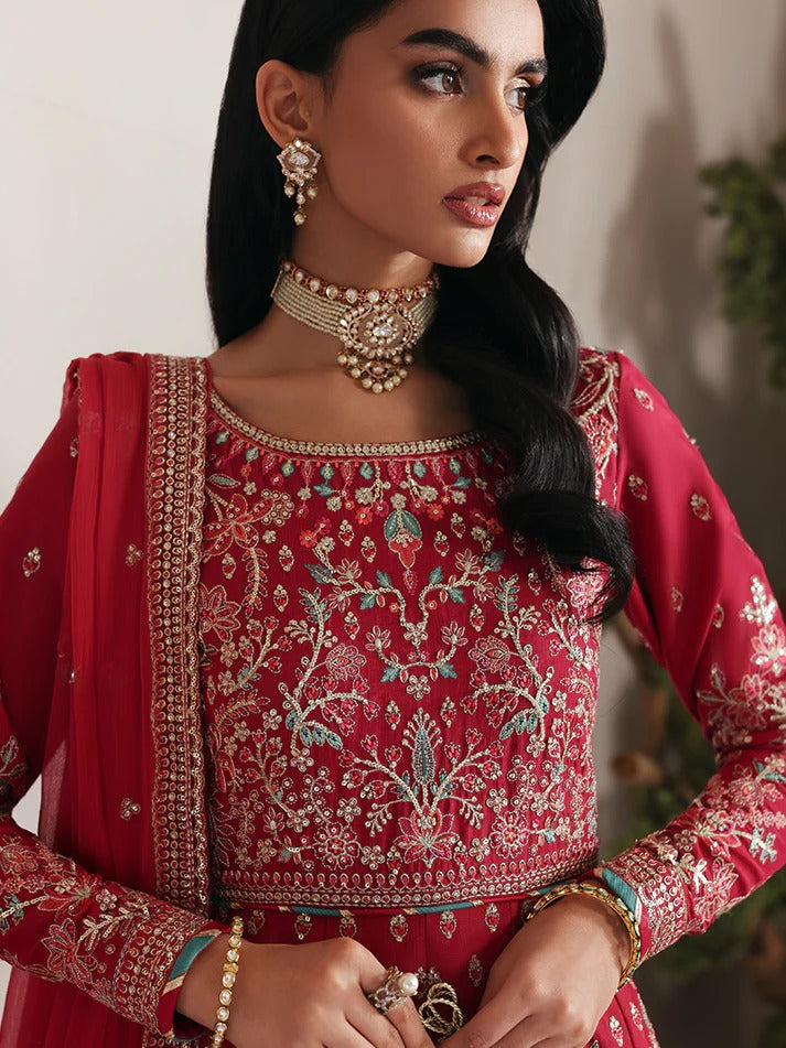 Discover luxury in this embroidered raw silk kalidaar featuring sequined bodice, chiffon dupatta with organza borders, and matching raw silk sharara.