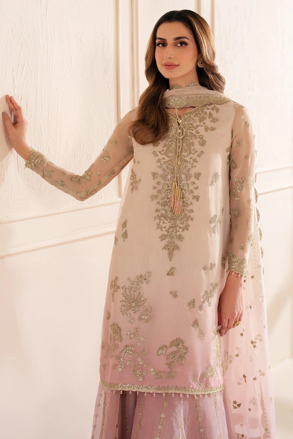 UC-3067 features digital printed chiffon with fine embroidery on front, sleeves, and dupatta—paired with a dyed rawsilk bottom for a refined look.