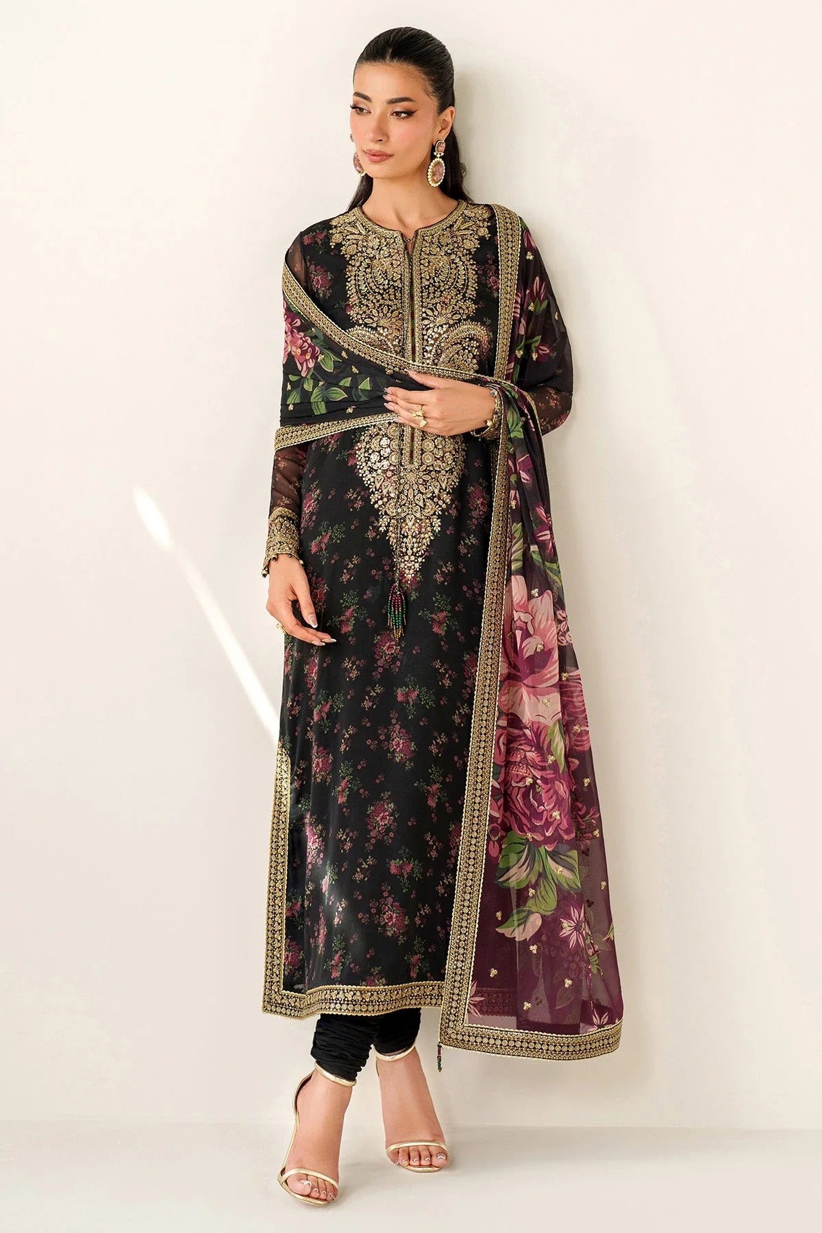 Digitally printed chiffon suit with intricate embroidery, bordered dupatta, and raw silk bottom—perfect for a graceful, formal, and timeless look.