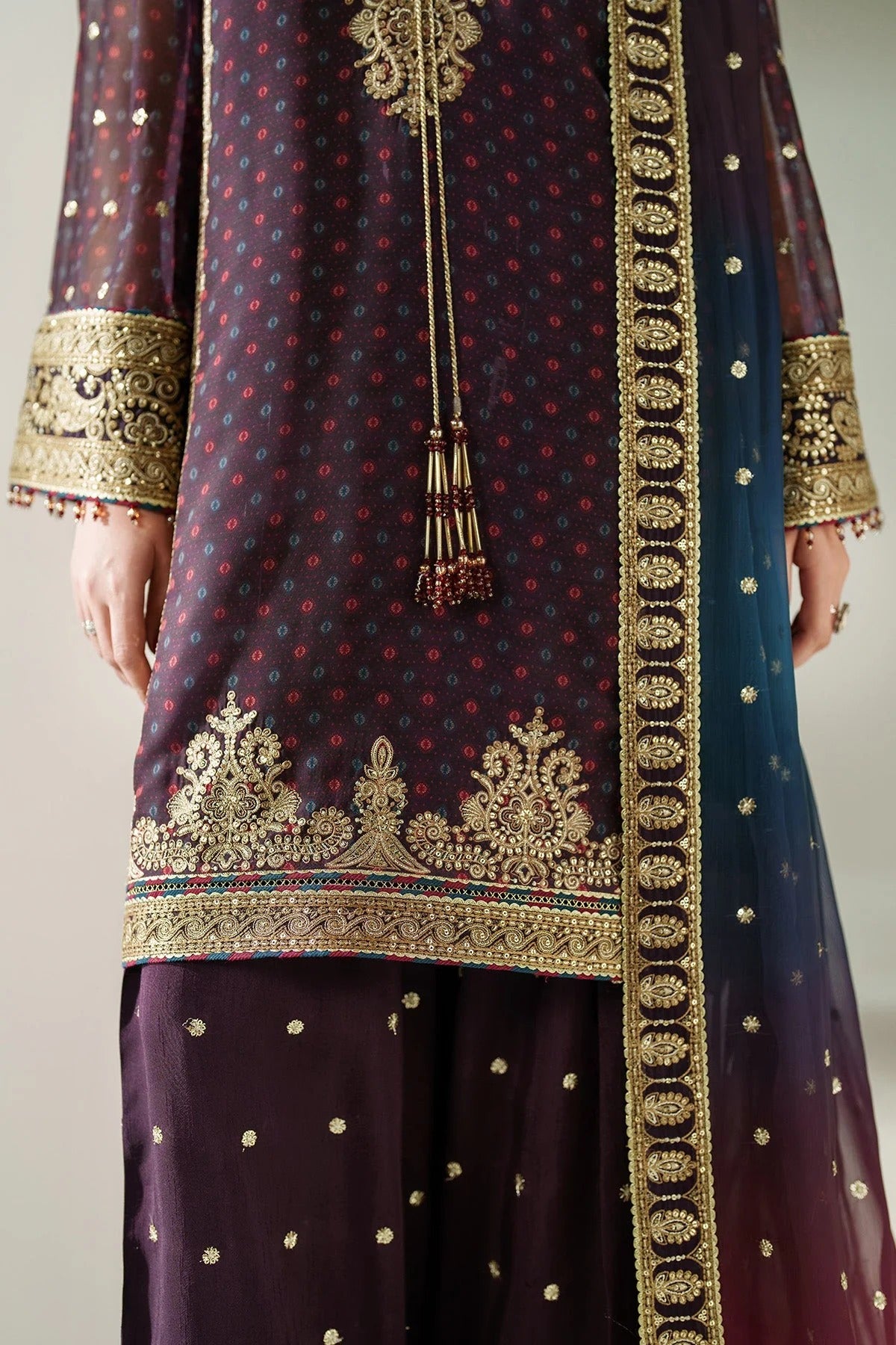 Elegantly embroidered chiffon with digital prints, bordered dupatta, and raw silk bottom—crafted for refined charm at weddings, events, or formal soirées.