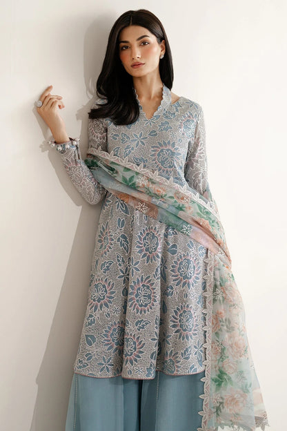 Featuring embroidered chiffon, organza dupatta, and rawsilk bottom, UC-3075 blends tradition and style—perfect for formal events and festive wear.