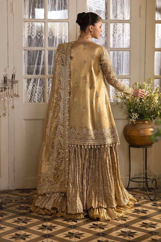 Opulent golden tissue outfit with intricate zari embroidery, dupatta, and jamavaar trousers. Ideal for weddings, formal events, or festive occasions.