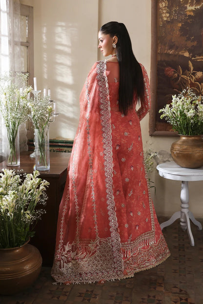 Chic coral organza dress with rich embroidery, magenta dupatta, and digital printed bustier & trouser. Perfect for festive and luxury fashion moments.