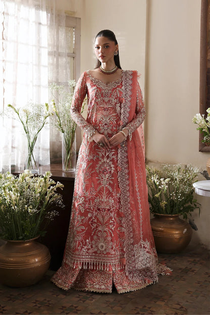 Chic coral organza dress with rich embroidery, magenta dupatta, and digital printed bustier & trouser. Perfect for festive and luxury fashion moments.