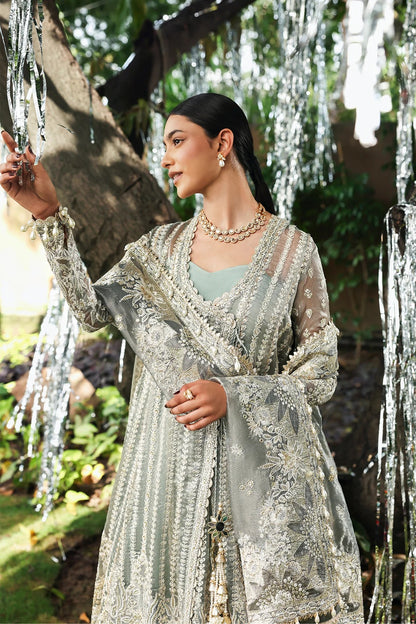 Refined dusty grey viscose outfit with zari embroidery, open front border, dupatta, and raw silk trouser. Perfect for formal and festive occasions.