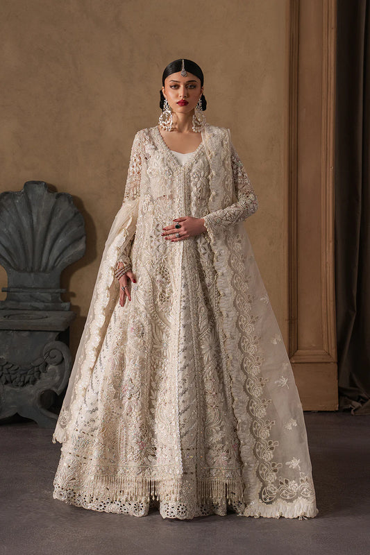 Luminous ivory bridal lehenga with intricate hand embellishment and floral embroidery. Paired with an elegant sheer dupatta for a timeless look.