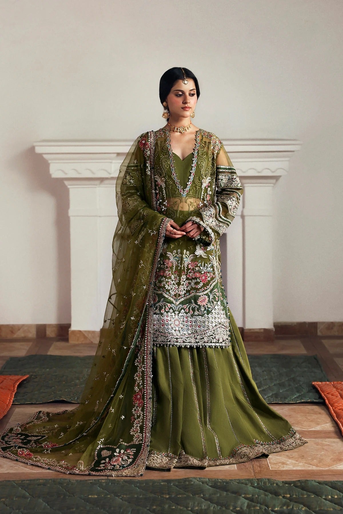 Elegant olive net and green viscose silk embroidered panels, sleeves, dupatta, and trousers with detailed borders for a graceful and stylish custom outfit.