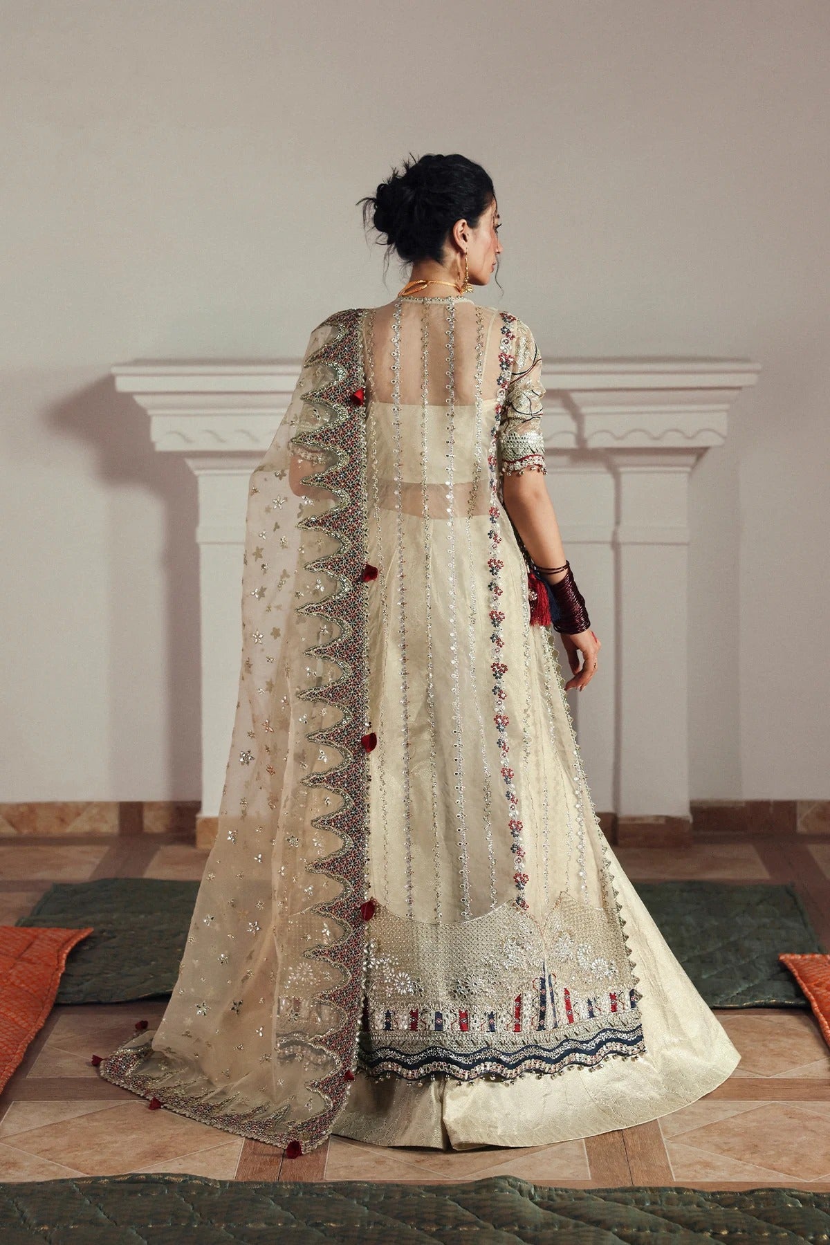 Elegant cream organza and silk embroidered panels, borders, sleeves, and dupatta with printed trousers for a complete luxurious fabric set.
