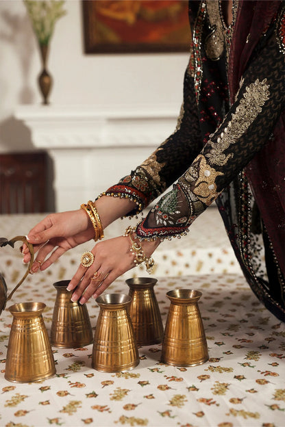 Elegant black organza and raw silk embroidered panels, sleeves, borders, and dupatta with intricate digital prints for a luxurious custom outfit creation.