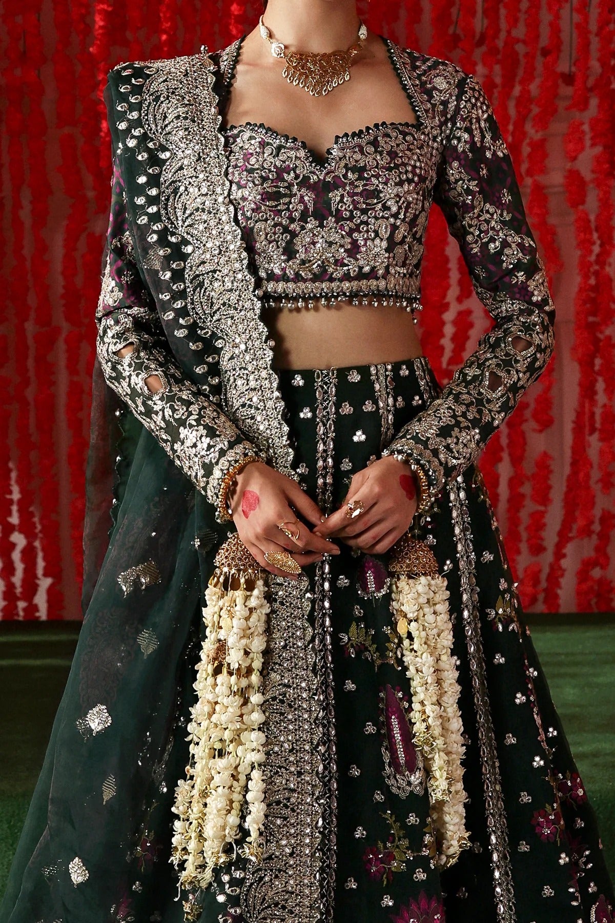 Stylish dark green raw silk and organza outfit with digital prints, embroidery, dupatta, and dyed trouser. A luxe pick for festive and formal wear.