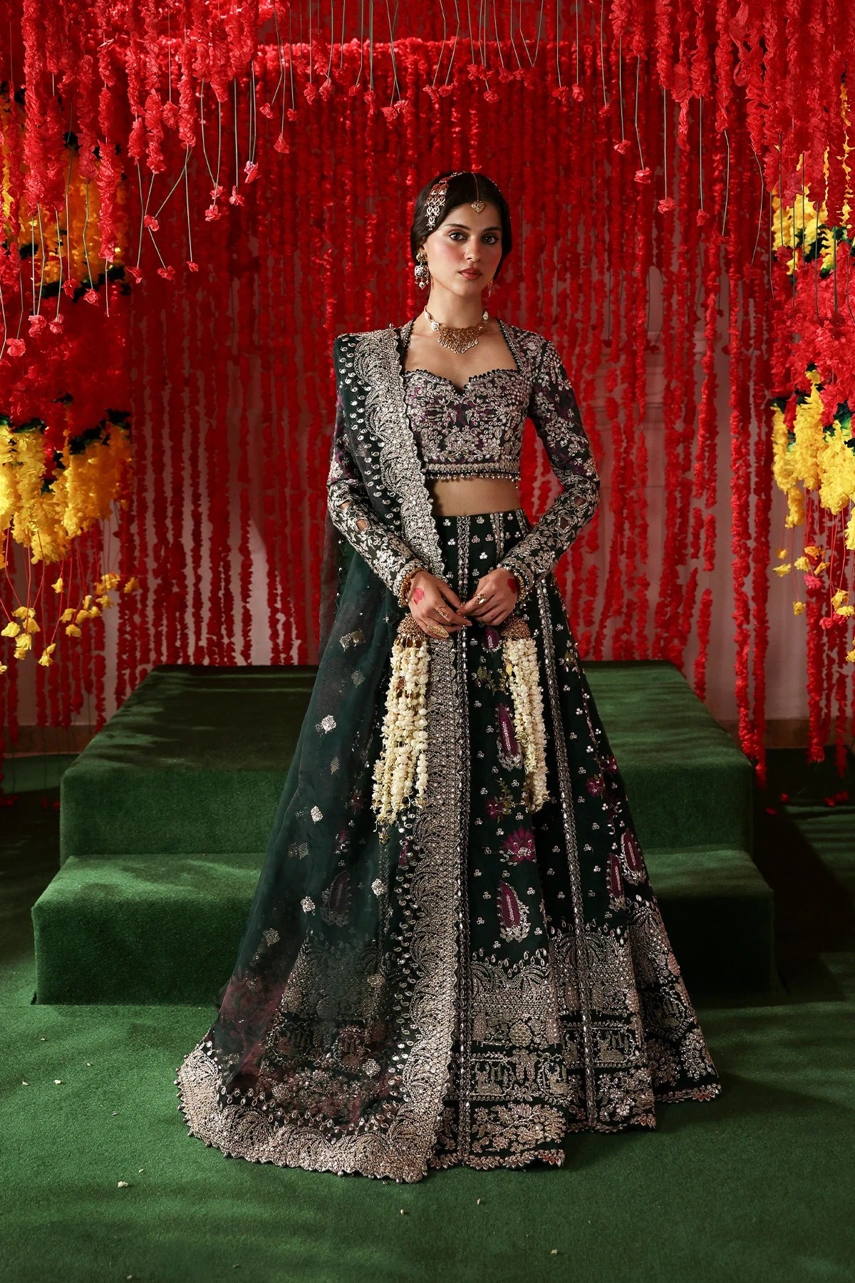 Stylish dark green raw silk and organza outfit with digital prints, embroidery, dupatta, and dyed trouser. A luxe pick for festive and formal wear.