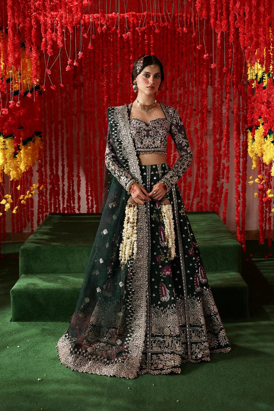 Stylish dark green raw silk and organza outfit with digital prints, embroidery, dupatta, and dyed trouser. A luxe pick for festive and formal wear.