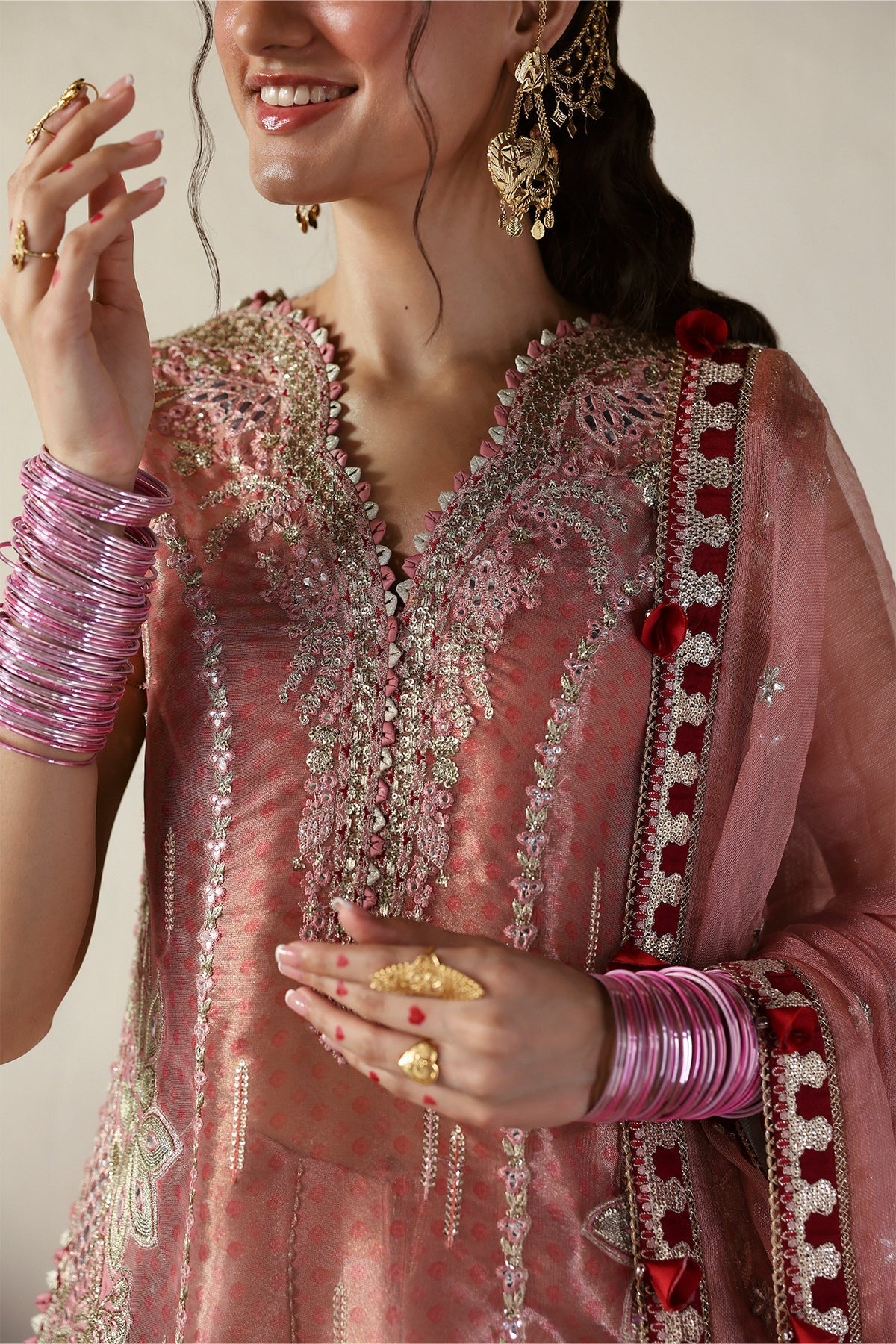 Luxurious pink tissue zari and raw silk embroidered panels, sleeves, borders, and dupatta with maroon accents, perfect for elegant custom dressmaking.